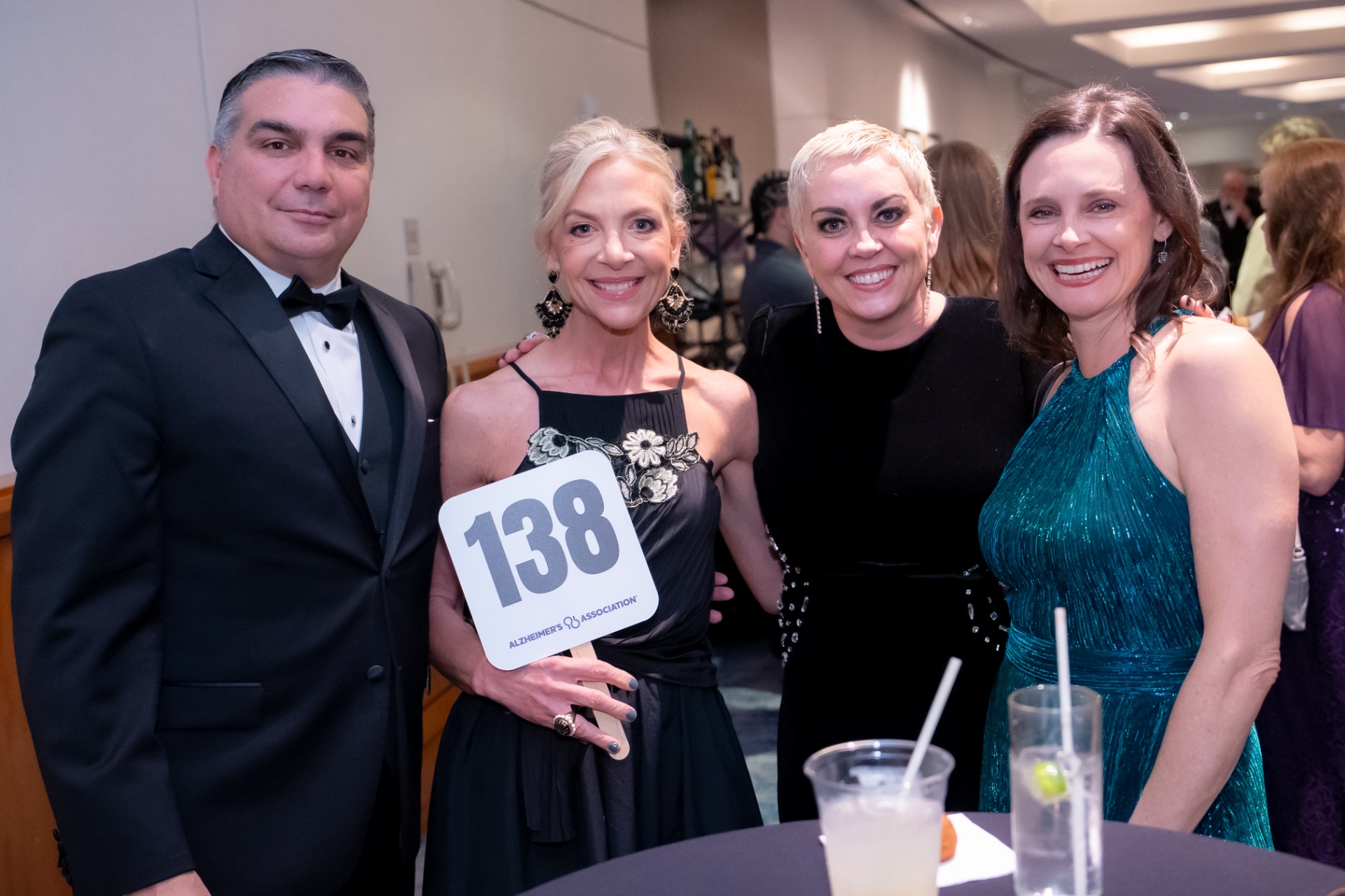 Bidders with paddle 138 at the auction